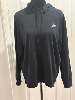 Nike Black Hoodie with White Swoosh and no pockets. Size Large